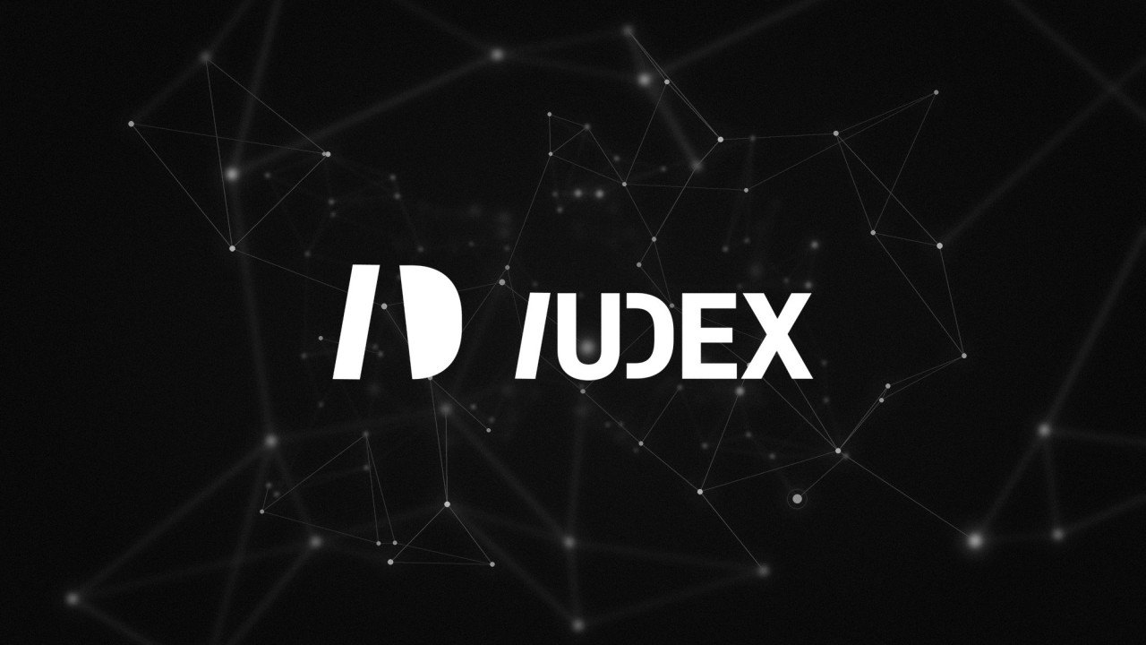 Red de nodos conectados sobre fondo negro, con el logotipo de IUDEX